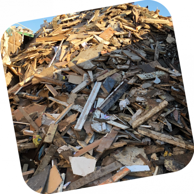 A large pile of wood at our waste transfer station